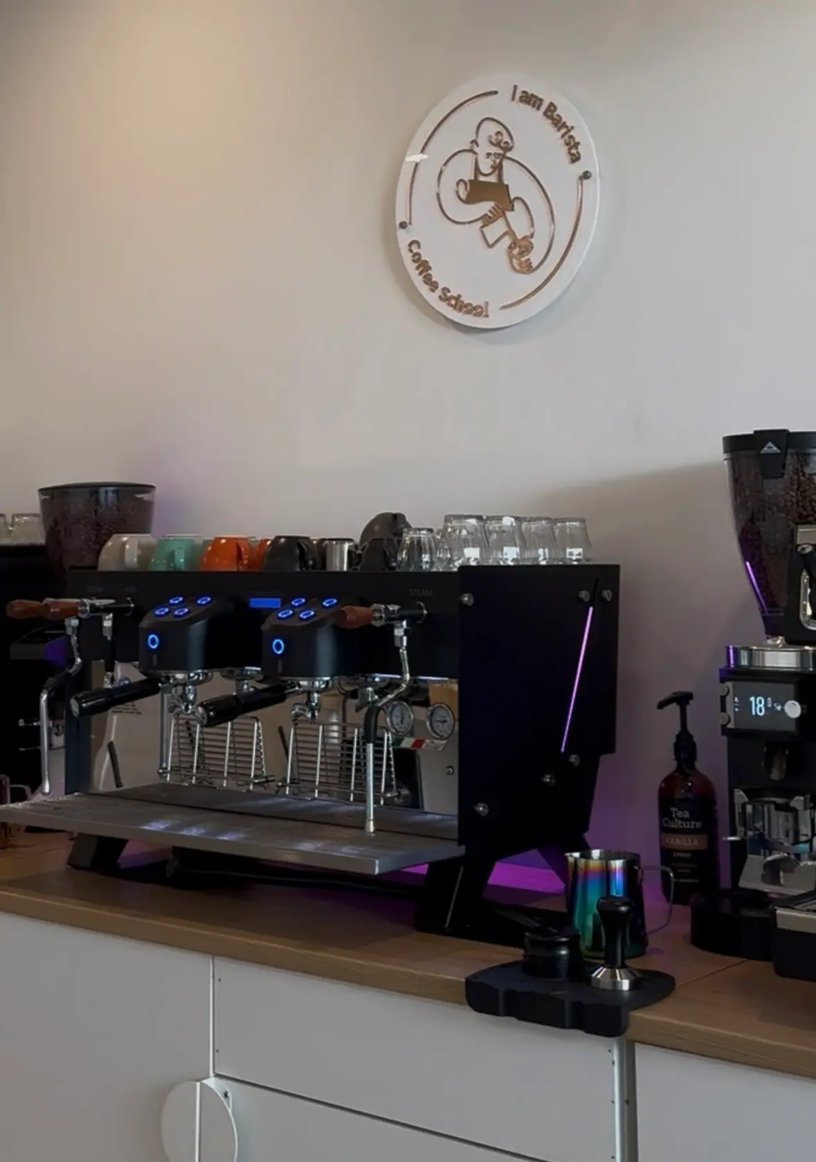 Professional espresso equipment at I Am Barista